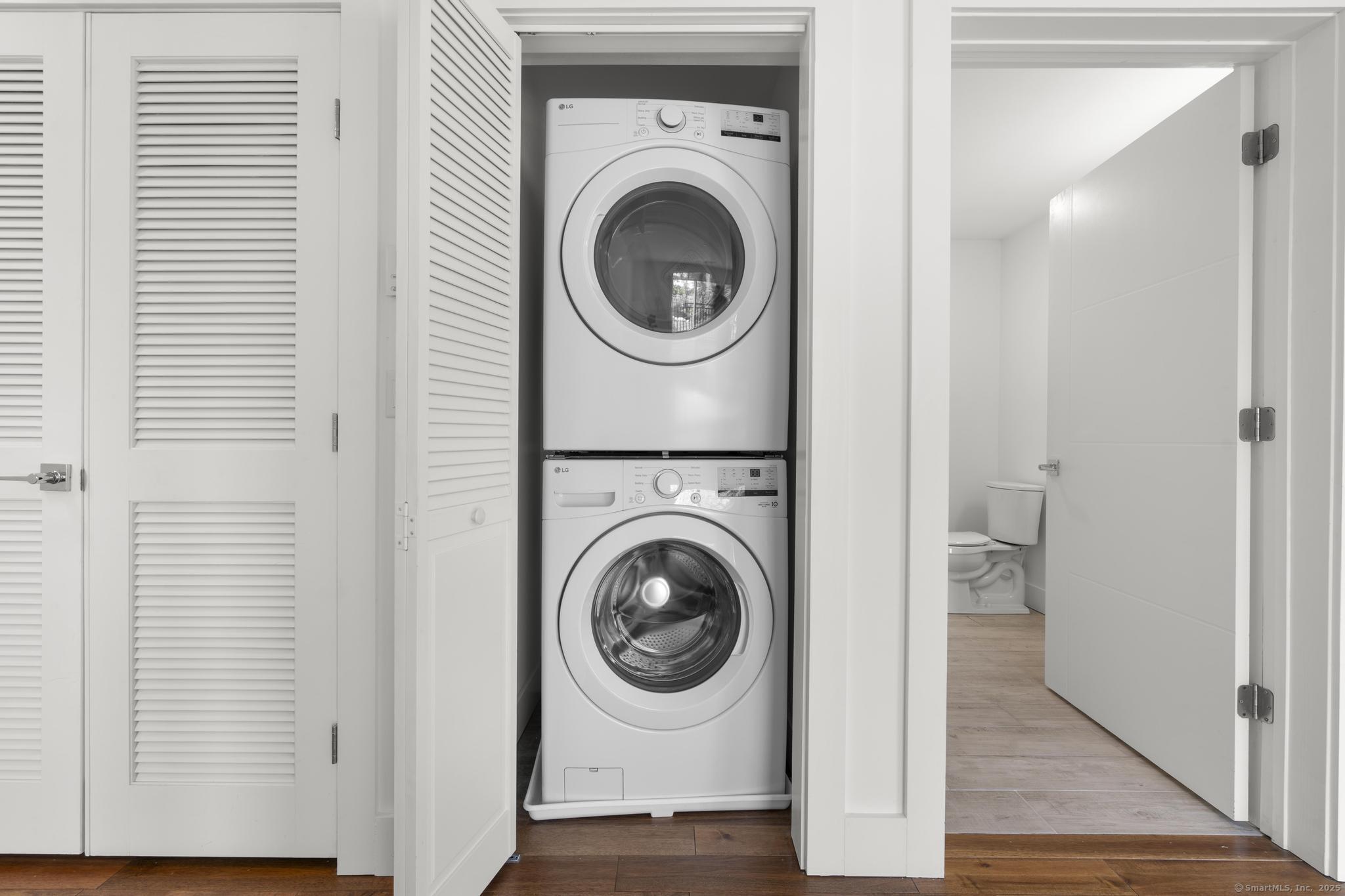 245 East Main Street, Unit 2 Branford, CT 06405 - Photo 32 of 40 a utility room with sink dryer and washer