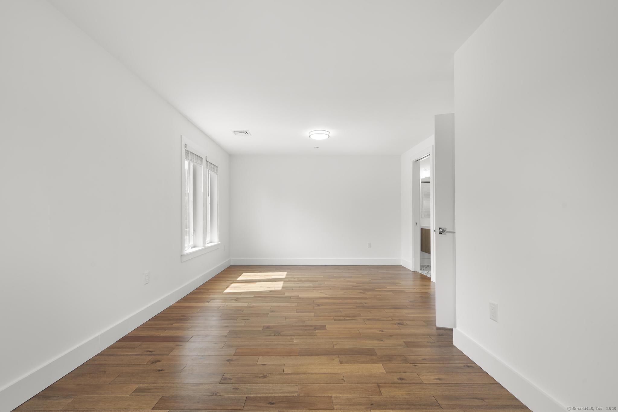 245 East Main Street, Unit 2 Branford, CT 06405 - Photo 38 of 40 a view of an empty room and window