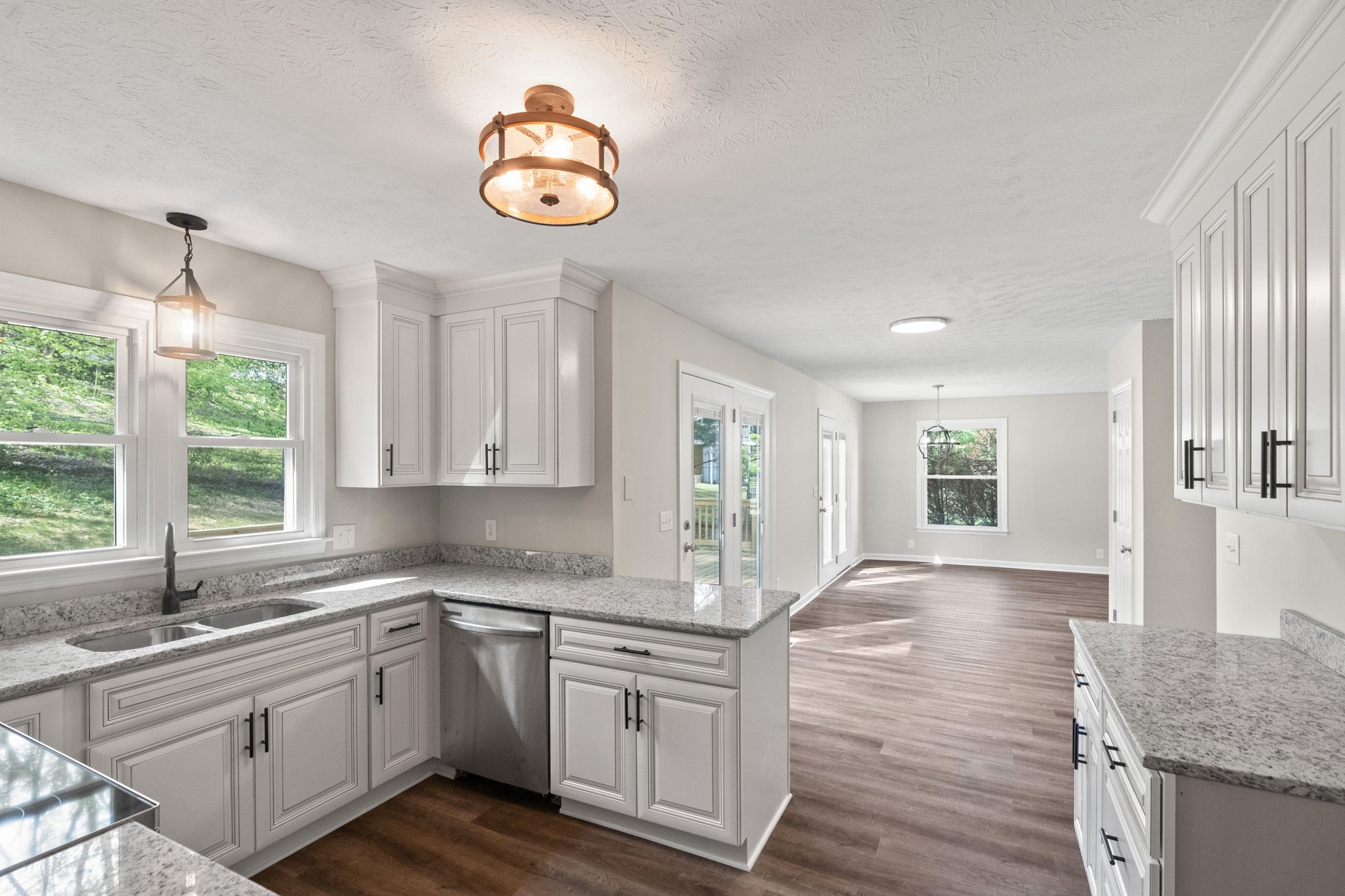 792 Spring Circle Springfield, TN 37172 - Photo 15 of 29 a kitchen with granite countertop white cabinets and window