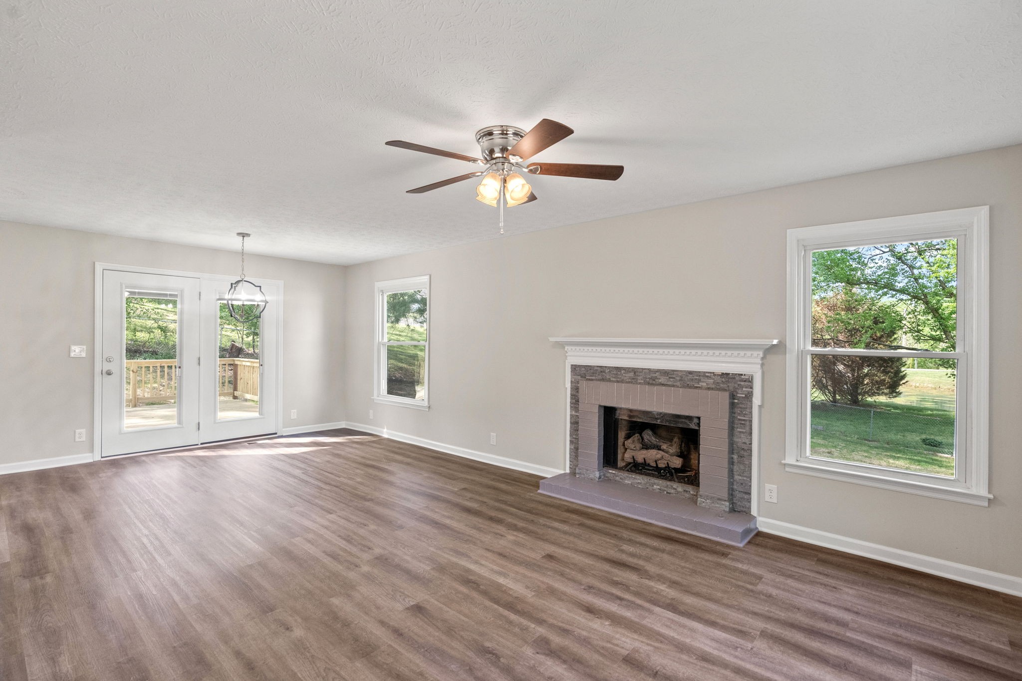 792 Spring Circle Springfield, TN 37172 - Photo 7 of 29 a view of an empty room with window and wooden floor
