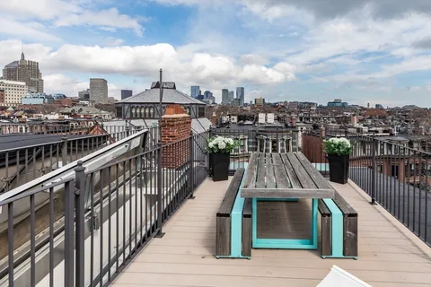 a view of a balcony with city view
