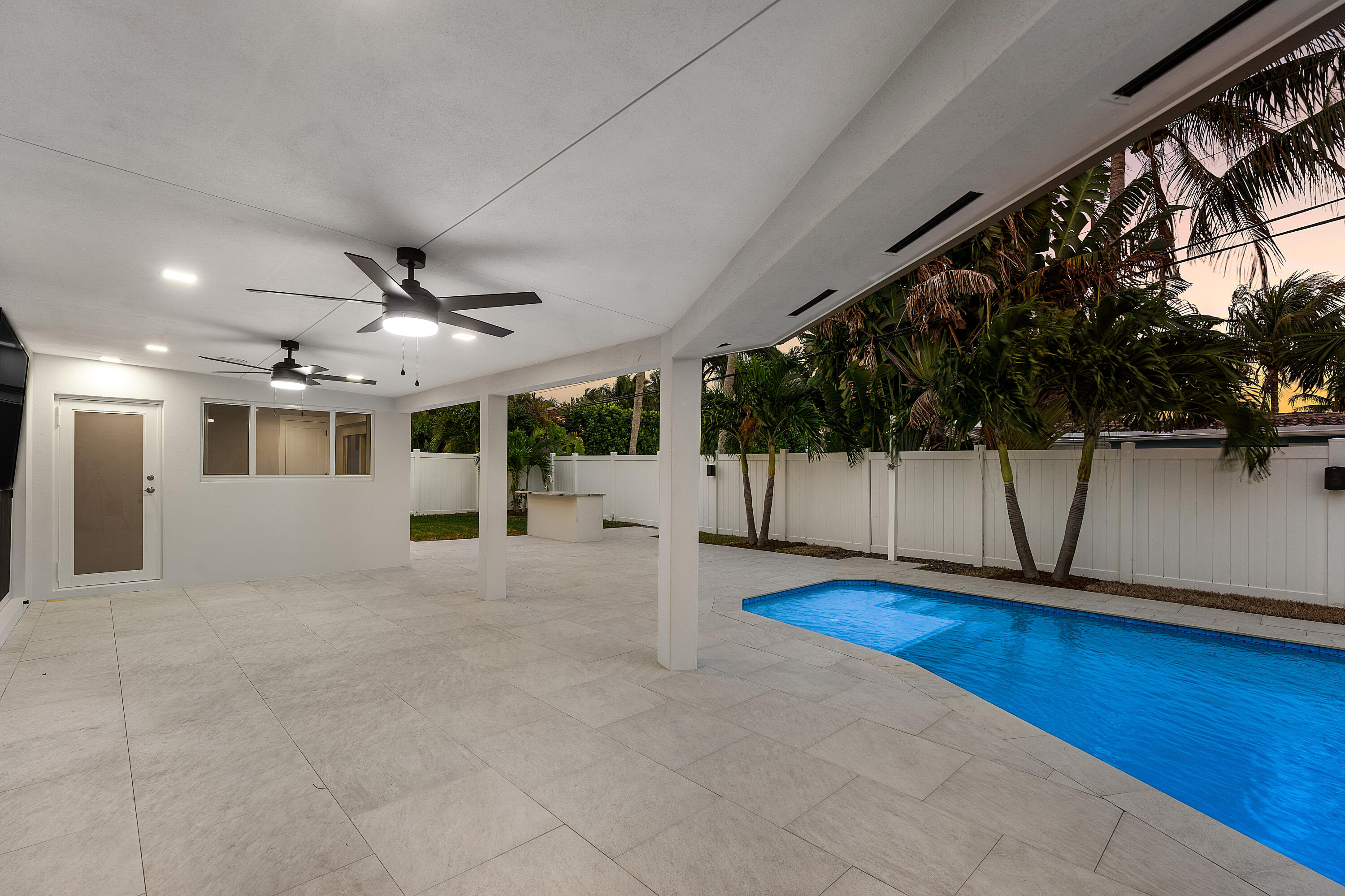 2846 Northeast 35th Court Lighthouse Point, FL 33064 - Photo 23 of 37 a view of a livingroom with a staircase
