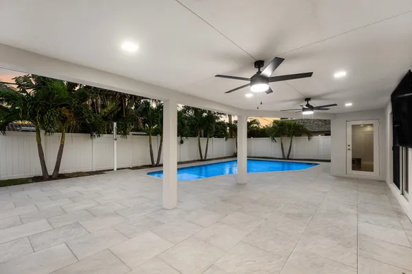 a view of a swimming pool and outdoor space