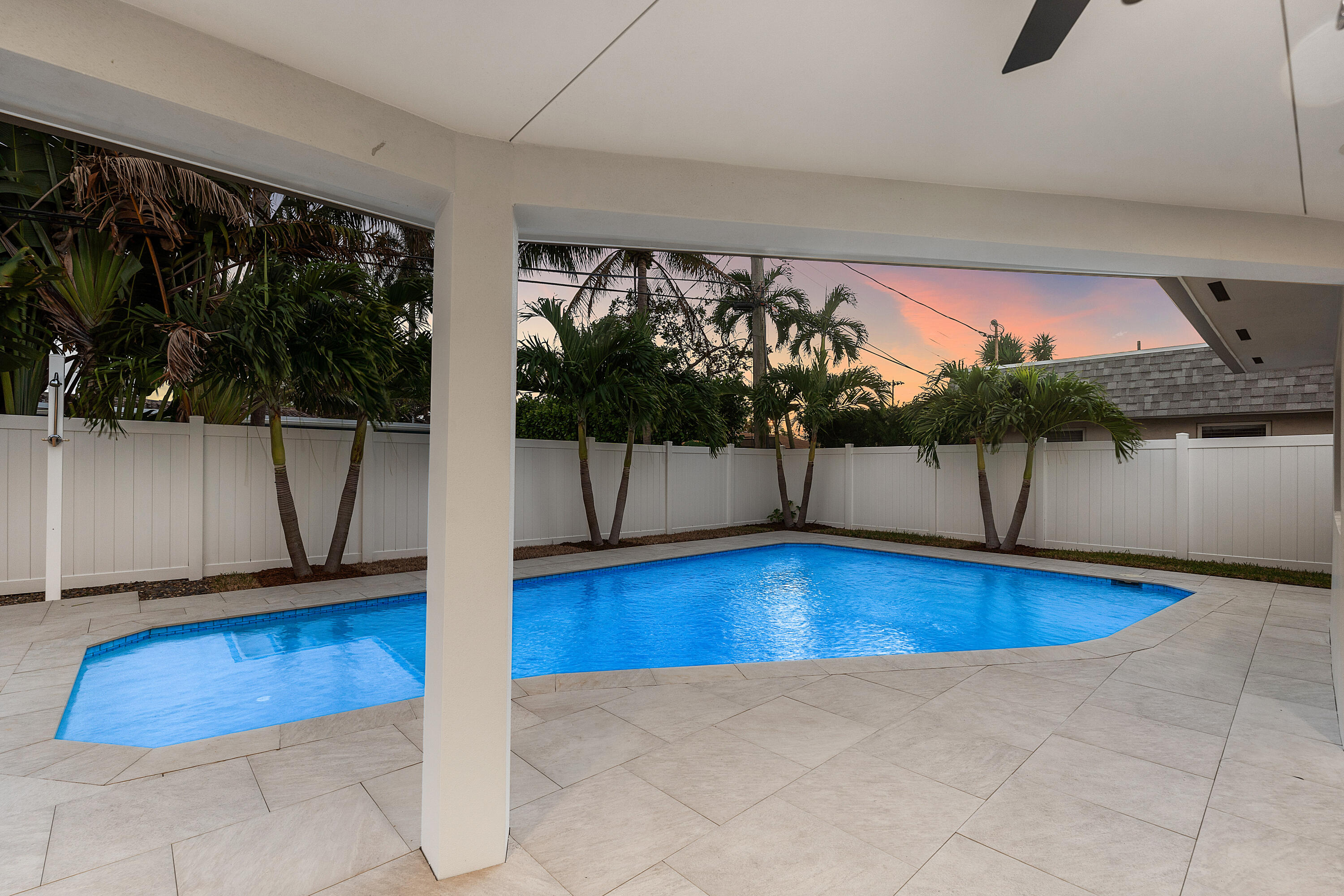 2846 Northeast 35th Court Lighthouse Point, FL 33064 - Photo 25 of 37 a view of a swimming pool and outdoor space