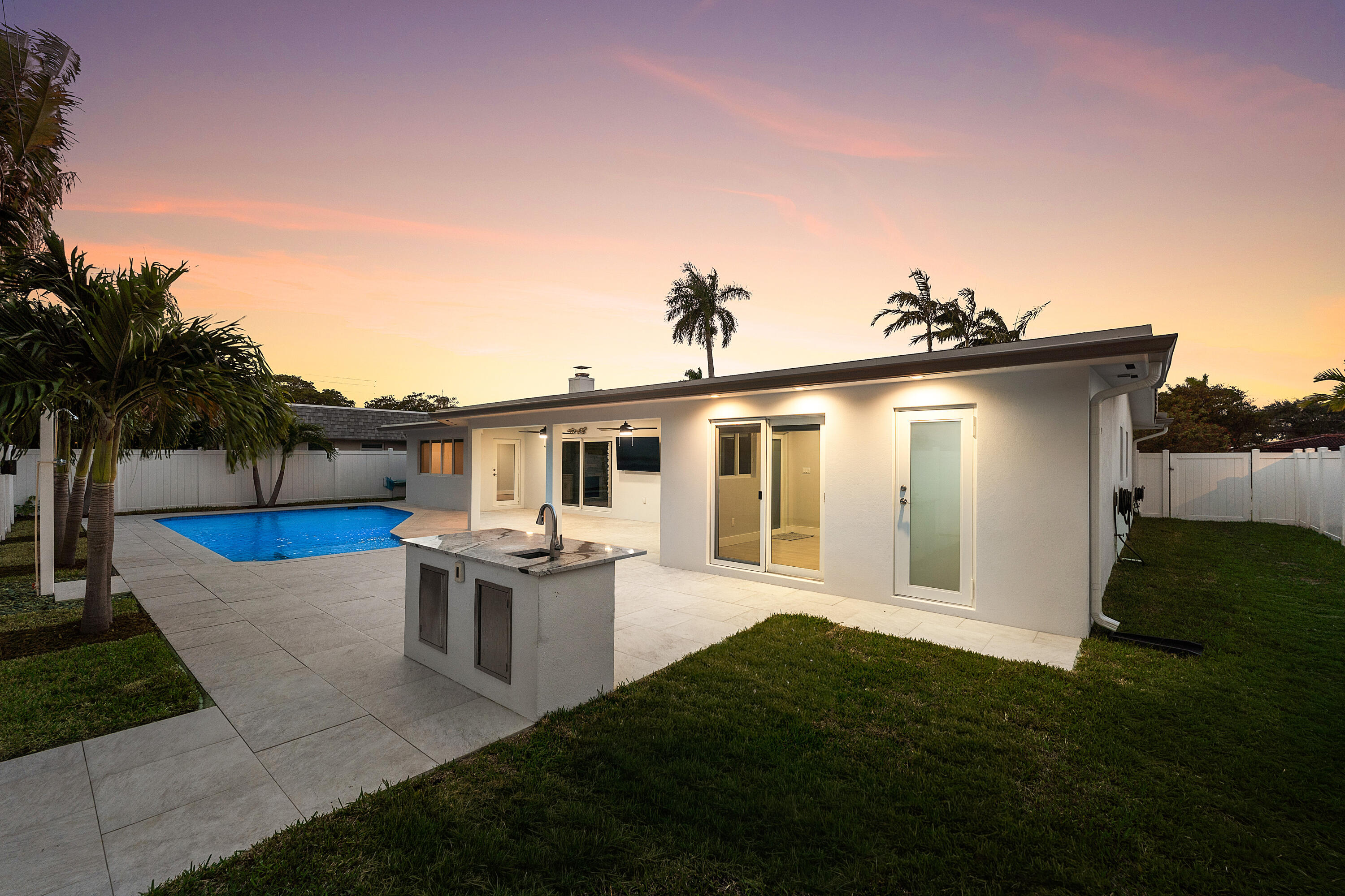 2846 Northeast 35th Court Lighthouse Point, FL 33064 - Photo 4 of 37 a view of a house with backyard and sitting area