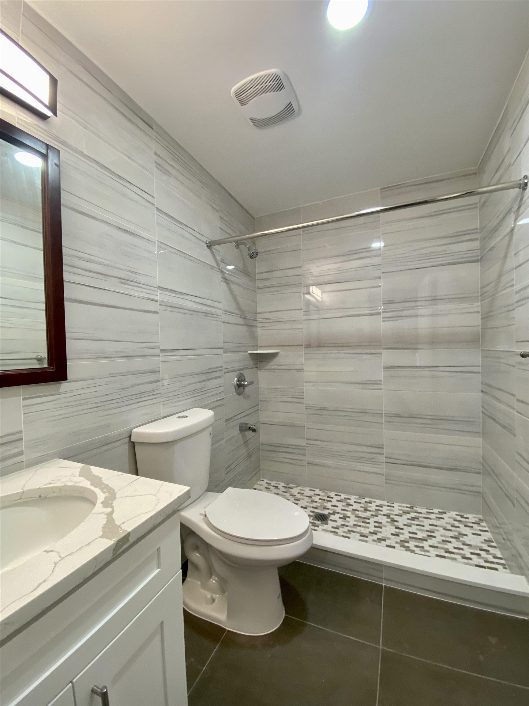 228 Tenafly Road, Unit 1 Tenafly, NJ 07670 - Photo 7 of 10 a bathroom with a toilet and a shower