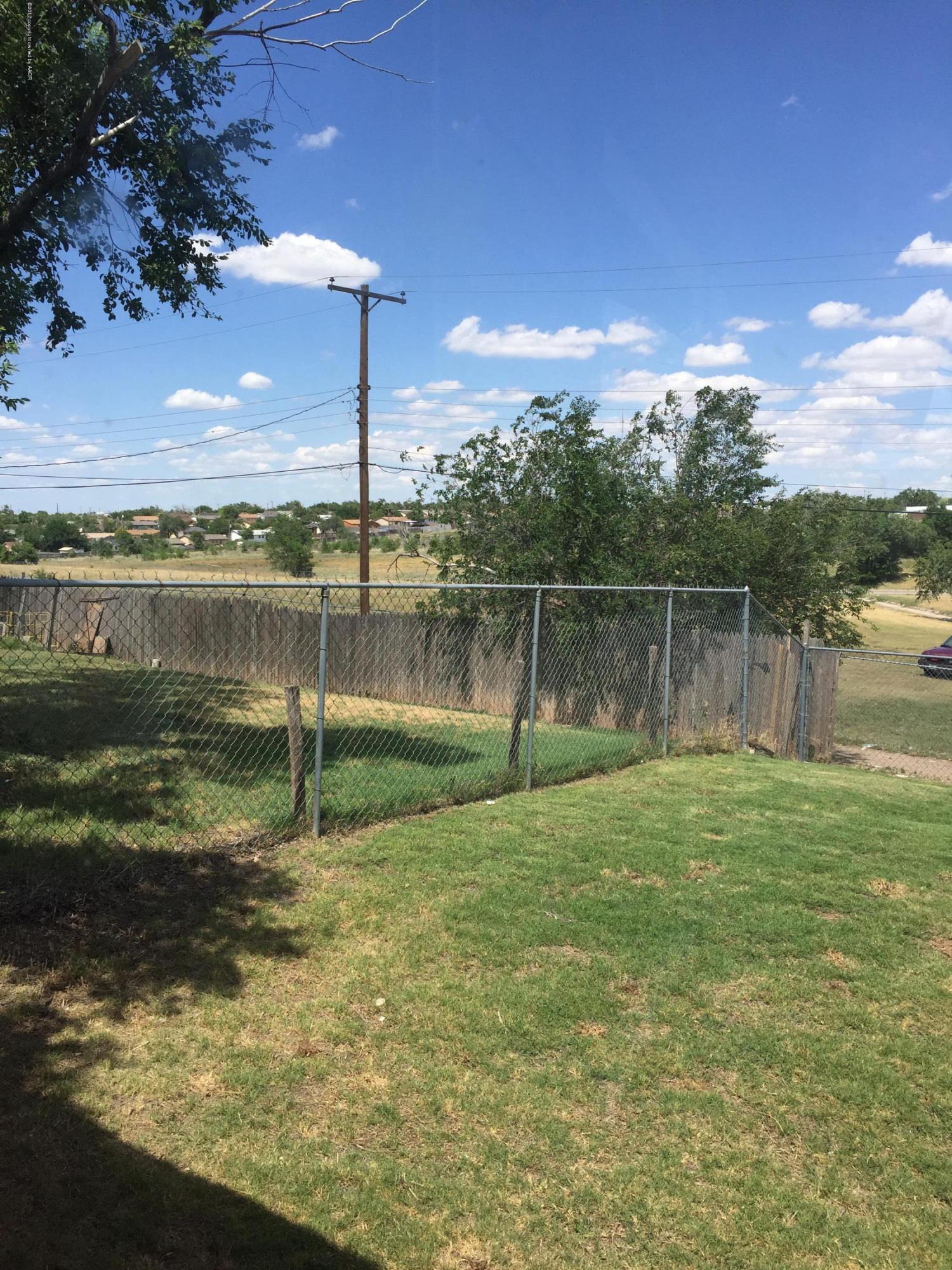 2402 Walnut Street Amarillo, TX 79107 - Photo 17 of 17 a view of a water pond with green space