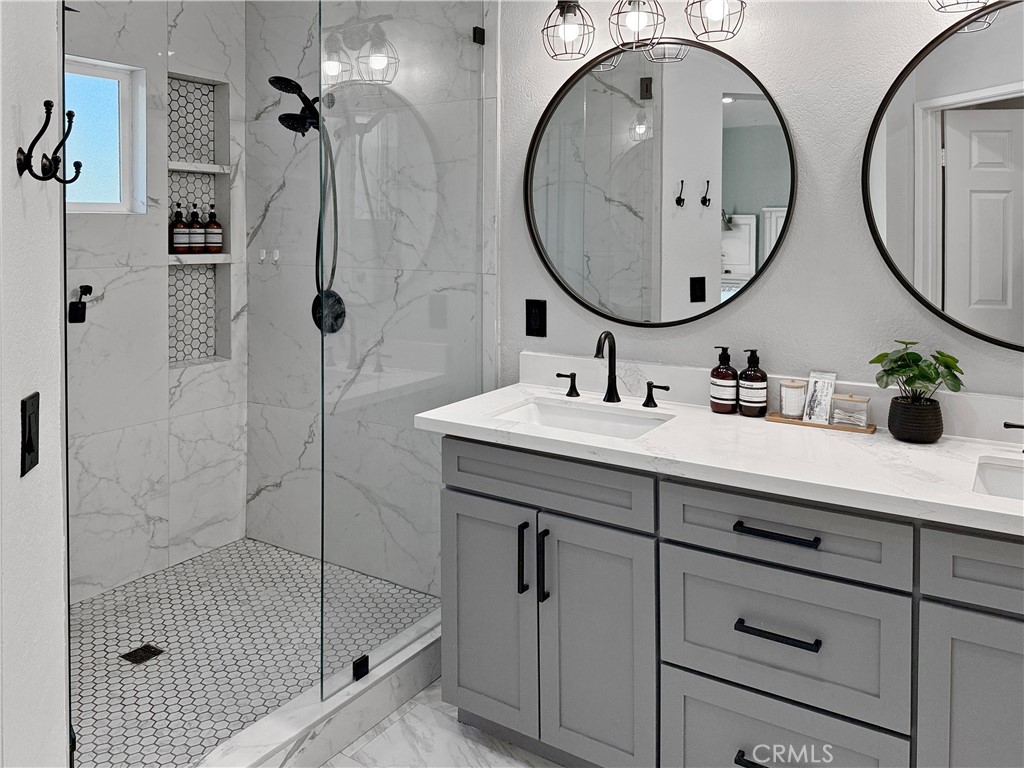16955 Lake Knoll Parkway Riverside, CA 92503 - Photo 28 of 42 a bathroom with a sink and a mirror
