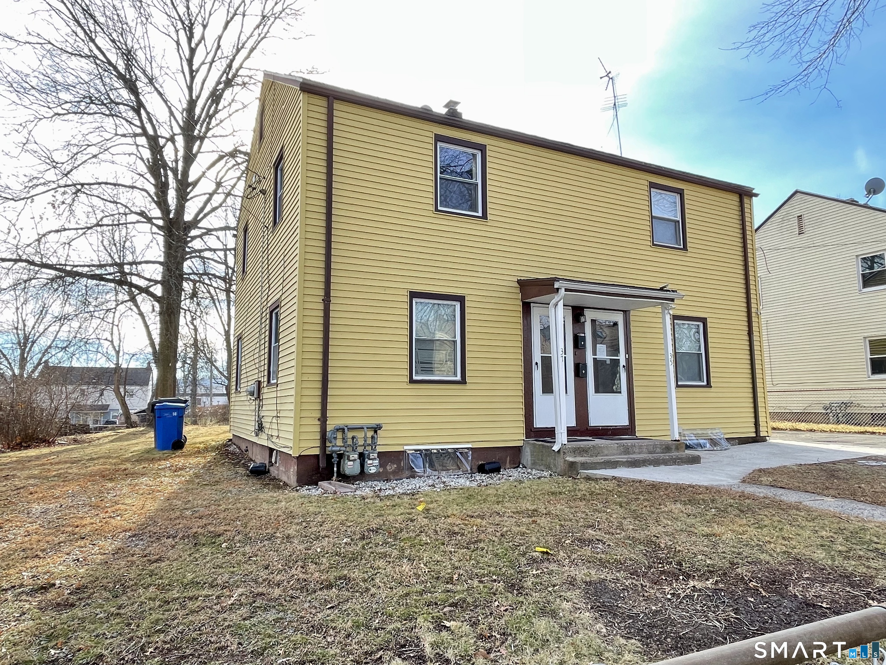 35 Baltic Street Hartford, CT 06112 - Photo 3 of 18 a front view of a house with a yard