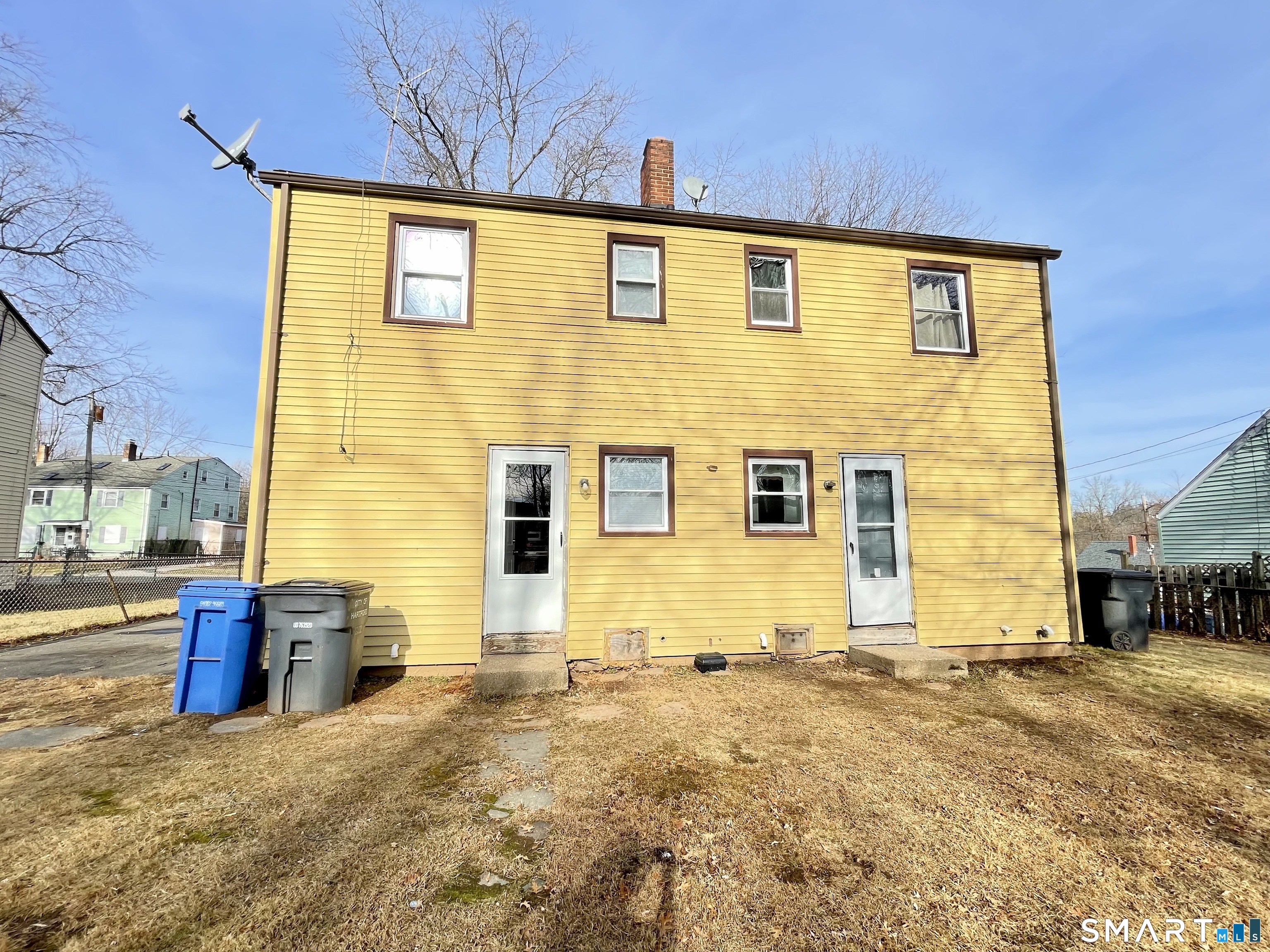 35 Baltic Street Hartford, CT 06112 - Photo 5 of 18 a view of a brick house with many windows
