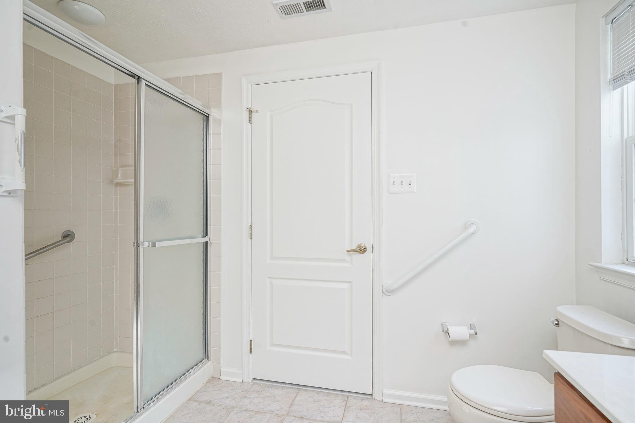 16 Magnolia Lane Sewell, NJ 08080 - Photo 14 of 21 a bathroom with a toilet and a shower