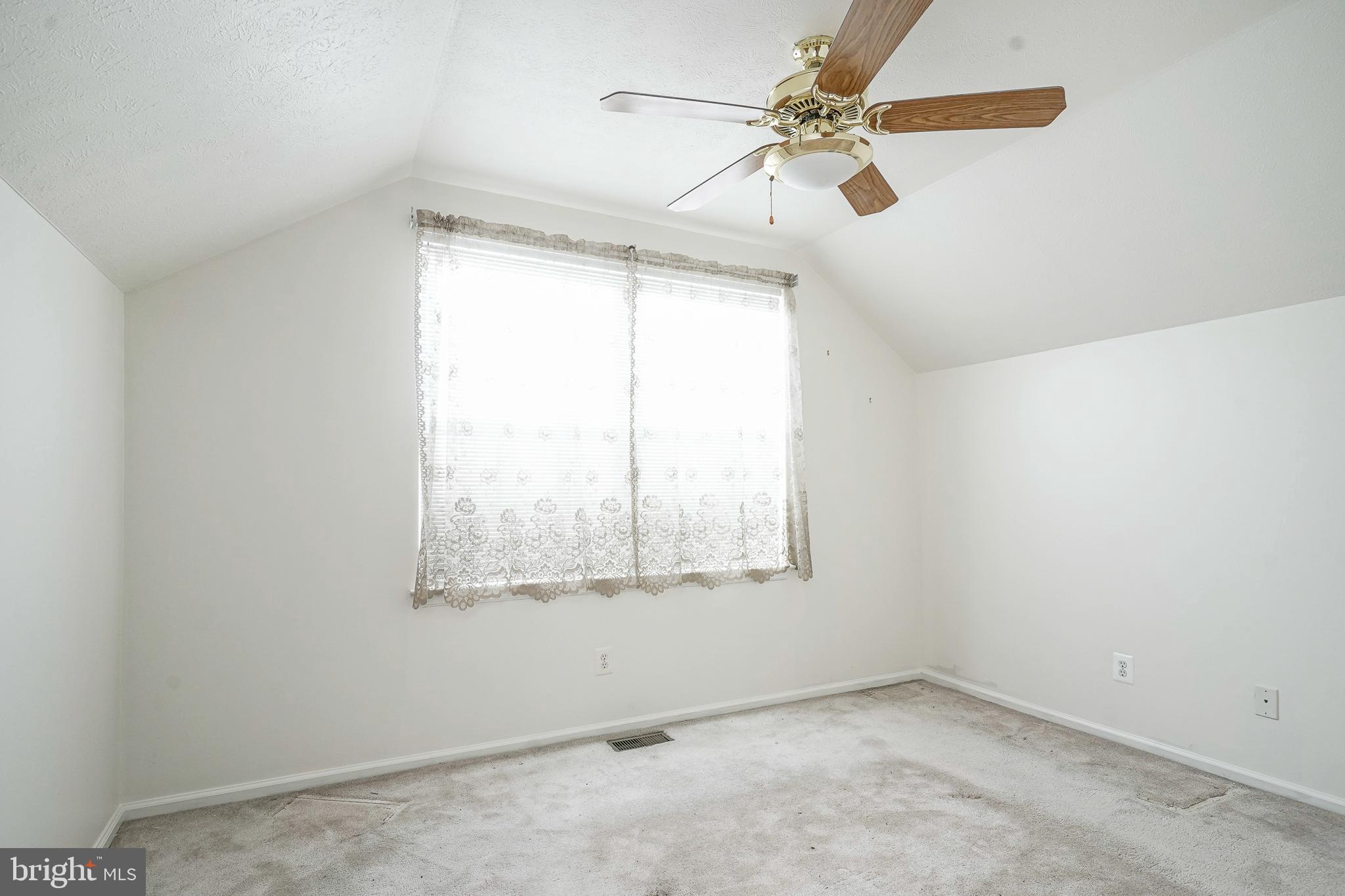 16 Magnolia Lane Sewell, NJ 08080 - Photo 16 of 21 an empty room with a window and a fan
