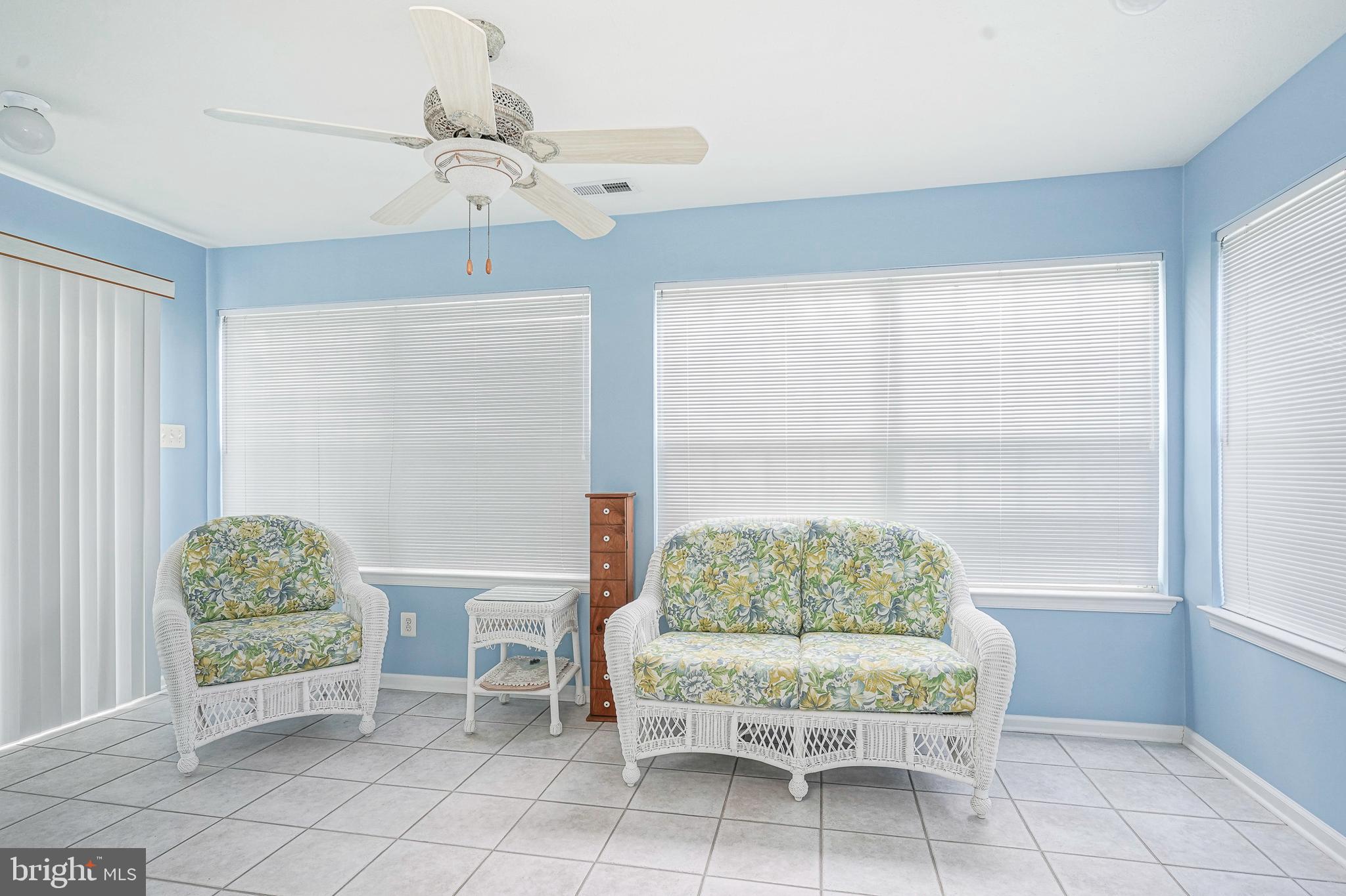 16 Magnolia Lane Sewell, NJ 08080 - Photo 7 of 21 a living room with furniture and a chandelier