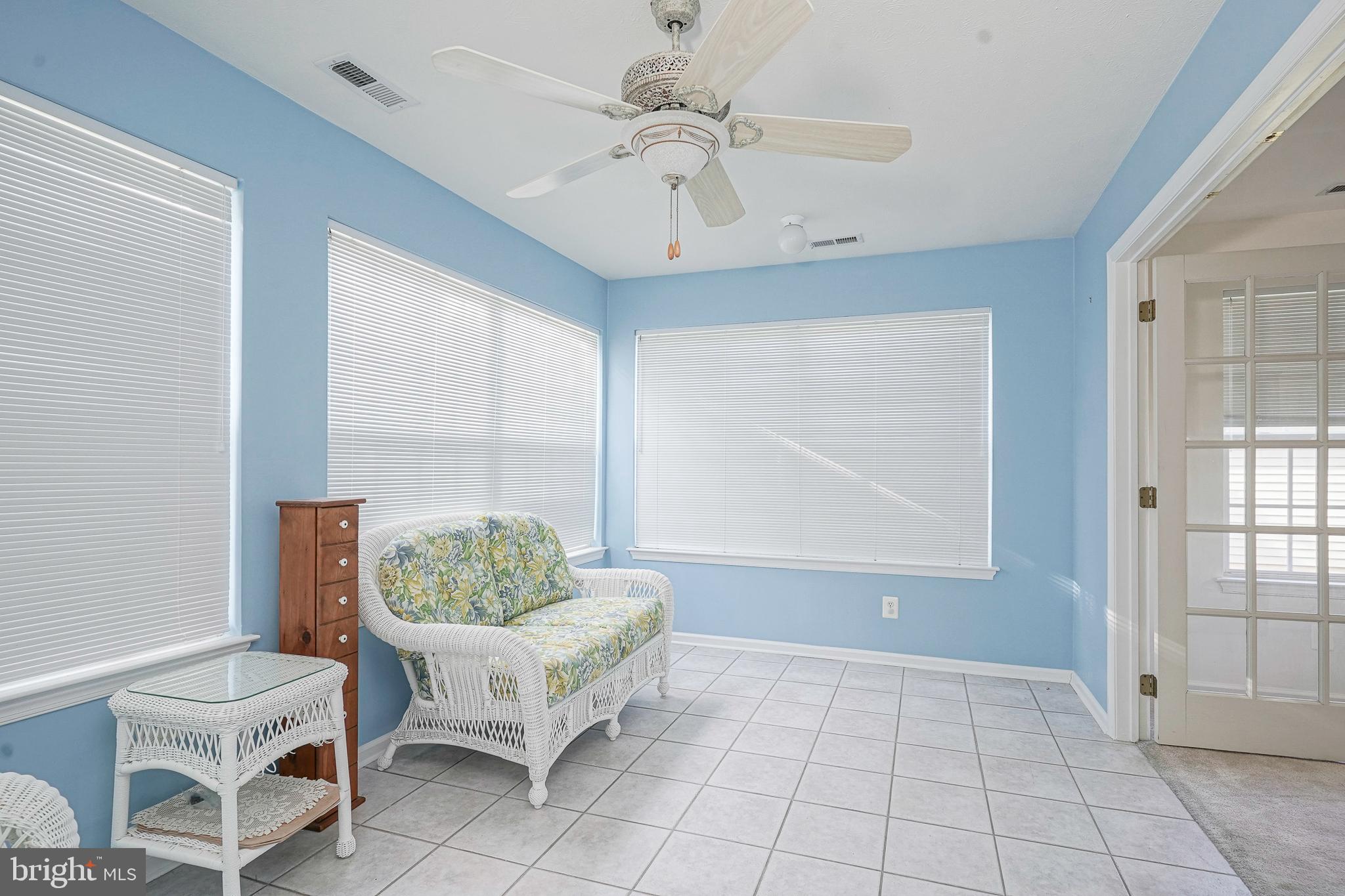 16 Magnolia Lane Sewell, NJ 08080 - Photo 8 of 21 a living room with furniture and a chandelier