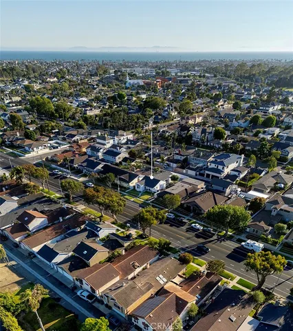 an aerial view of residential house with parking space