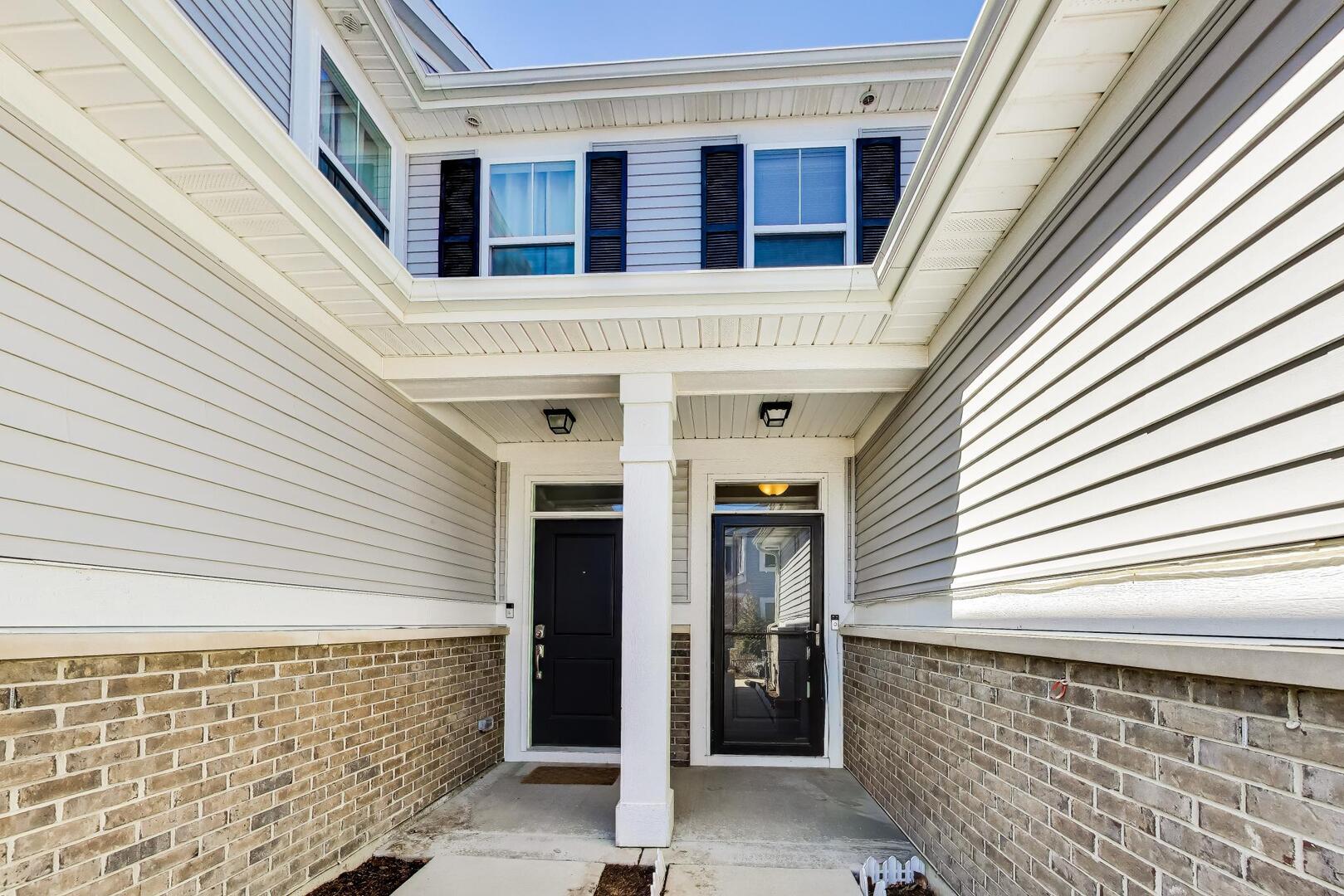 4152 Calder Lane Aurora, IL 60504 - Photo 3 of 30 a view of front door with outdoor space