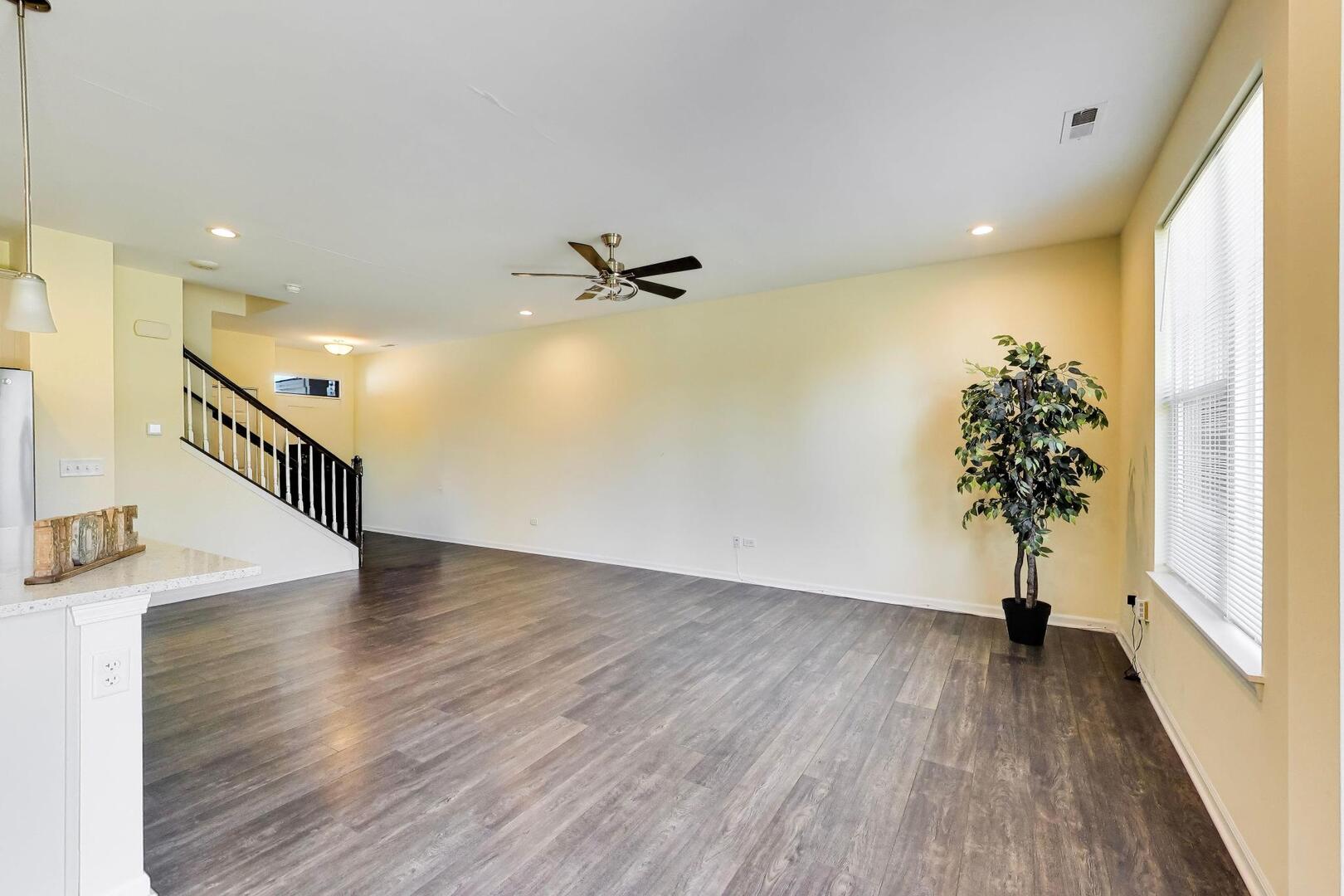 4152 Calder Lane Aurora, IL 60504 - Photo 6 of 30 a view of entryway with wooden floor