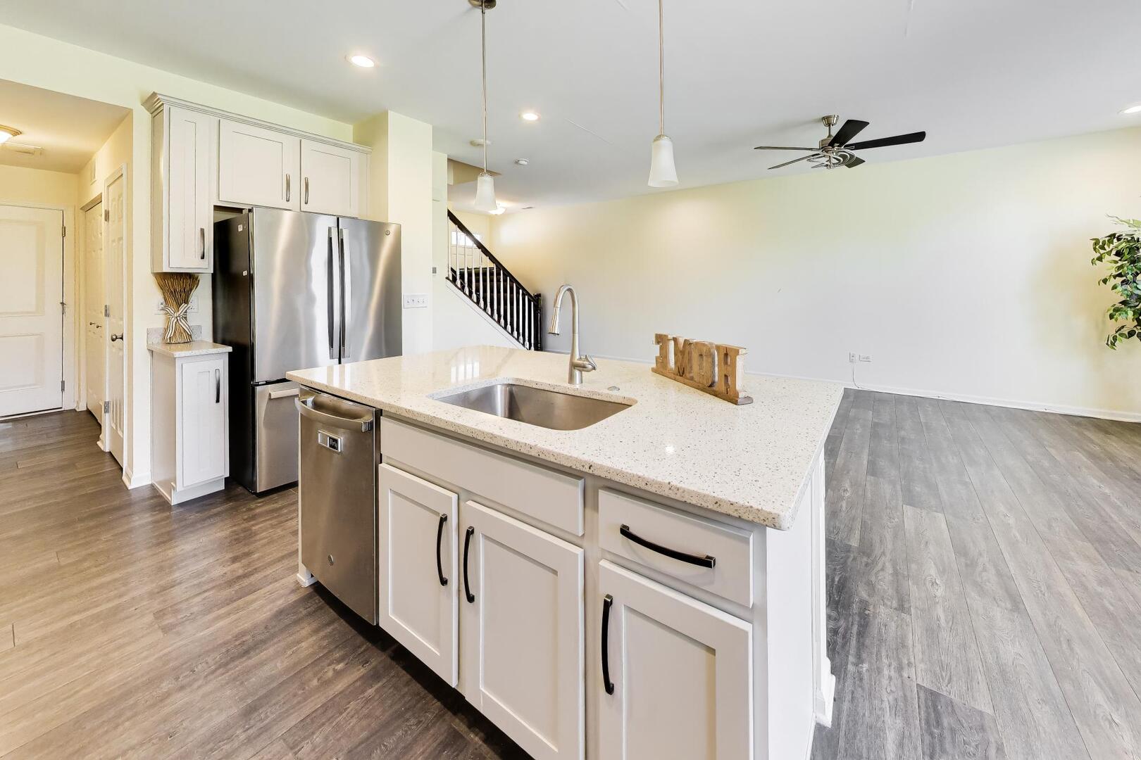 4152 Calder Lane Aurora, IL 60504 - Photo 9 of 30 a kitchen with cabinets and stainless steel appliances