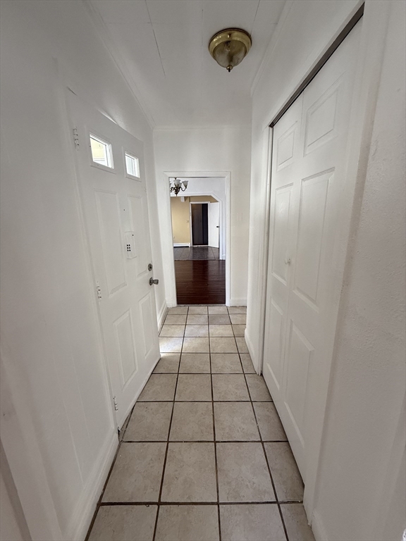 213 Concord Street, Unit 1 Lowell, MA 01852 - Photo 3 of 12 a view of a hallway view of a kitchen
