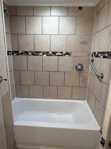 a bathroom with a bathtub
