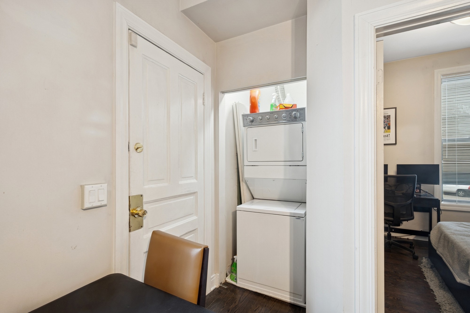 1302 North Cleveland Avenue, Unit 2 Chicago, IL 60610 - Photo 11 of 12 a hallway with cabinets and wooden floor