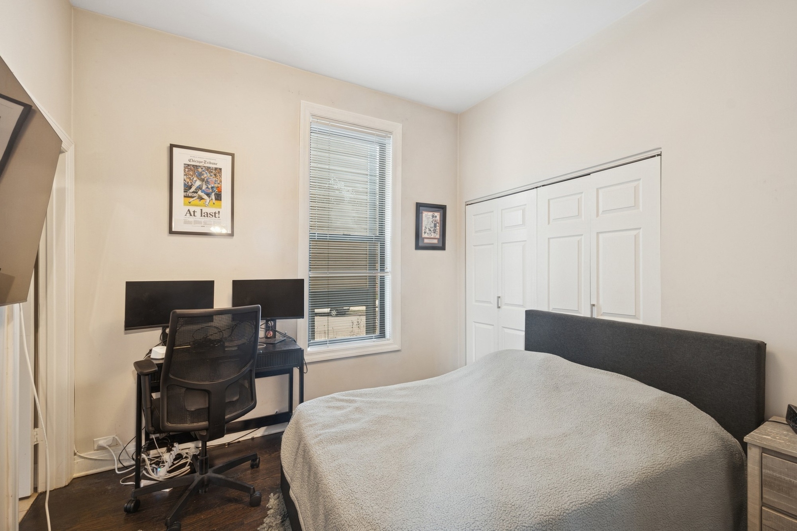 1302 North Cleveland Avenue, Unit 2 Chicago, IL 60610 - Photo 7 of 12 a bedroom with a bed and a window