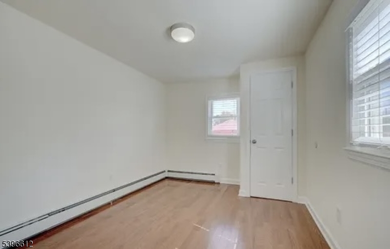 443 Downer Street Westfield, NJ 07090 - Photo 11 of 18 an empty room with windows