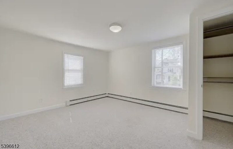 443 Downer Street Westfield, NJ 07090 - Photo 14 of 18 a view of an empty room with a window