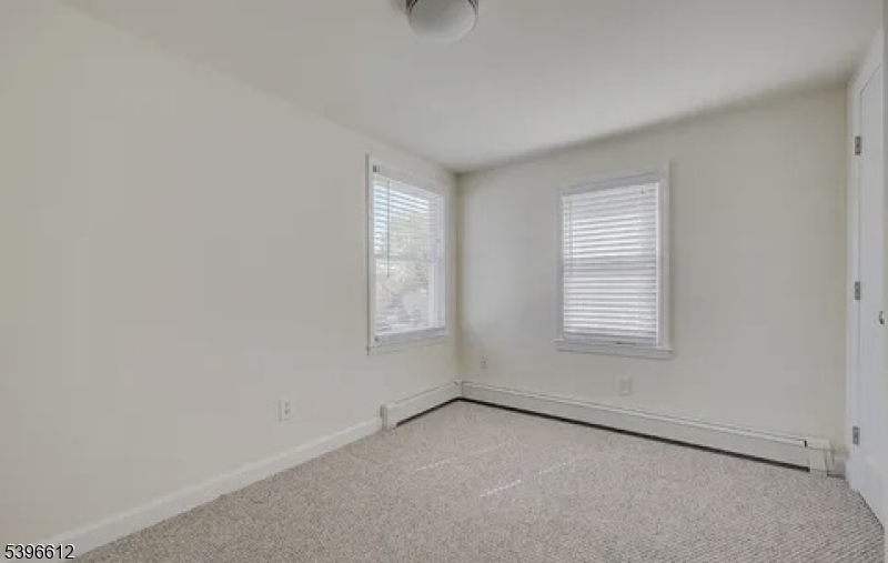 443 Downer Street Westfield, NJ 07090 - Photo 17 of 18 an empty room with a window