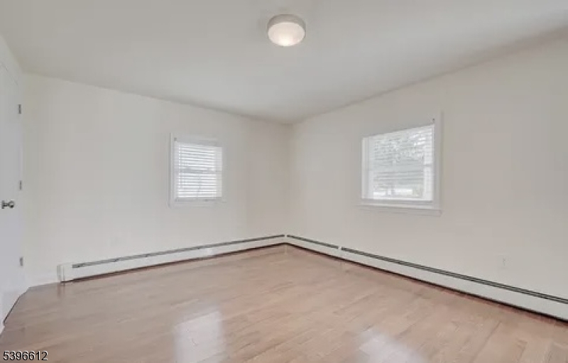443 Downer Street Westfield, NJ 07090 - Photo 6 of 18 an empty room with a window