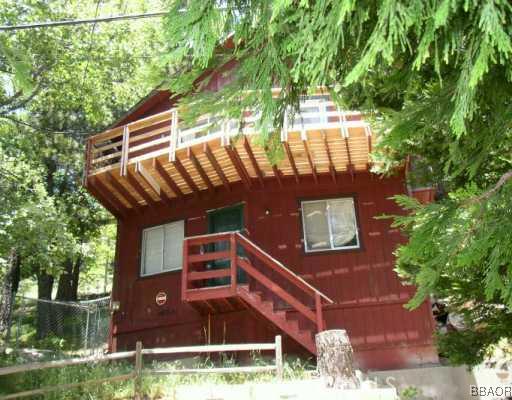 26600 Valley View Lake Rimforest, CA 92378 - Photo 1 of 5 a view of a house with a small yard