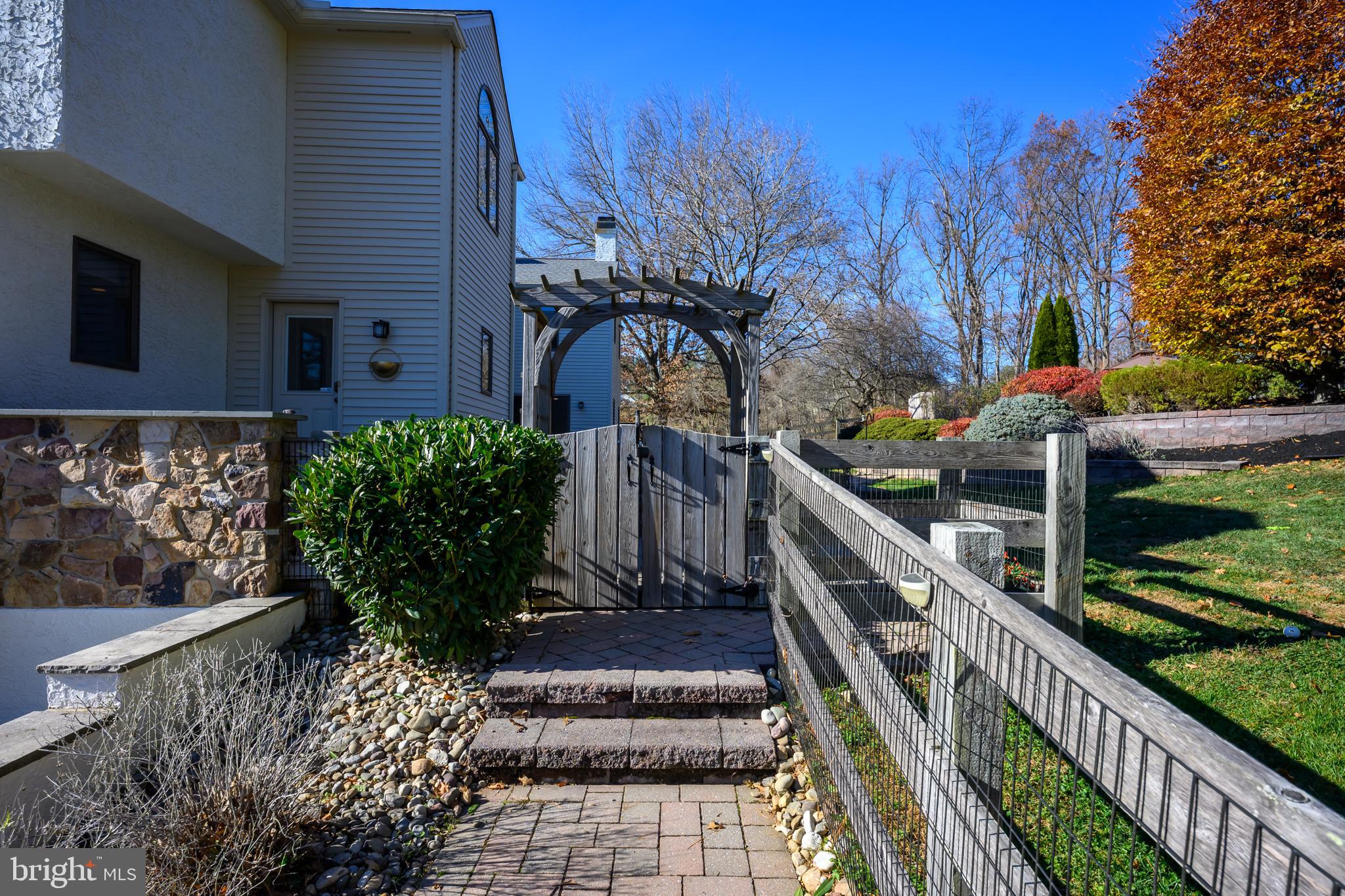 907 Lenape Road West Chester, PA 19382 - Photo 9 of 44 Back Walkway w/Gated Arbor