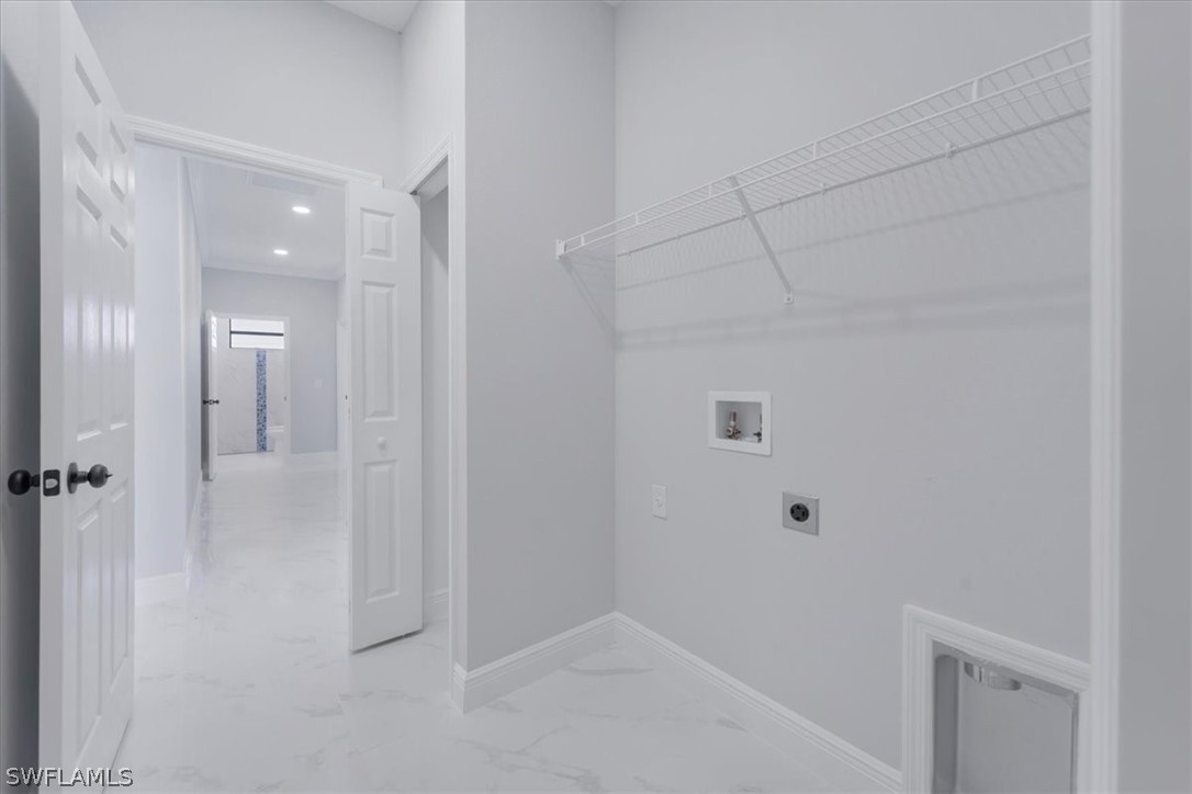 3915 20th Street Southwest Lehigh Acres, FL 33976 - Photo 14 of 50 a view of a bathroom