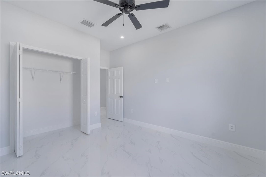 3915 20th Street Southwest Lehigh Acres, FL 33976 - Photo 17 of 50 a view of an empty room