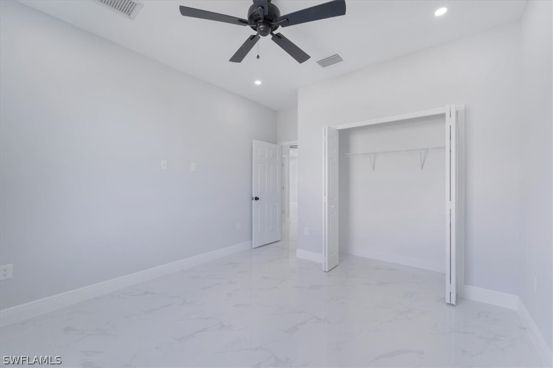 3915 20th Street Southwest Lehigh Acres, FL 33976 - Photo 18 of 50 a view of an empty room