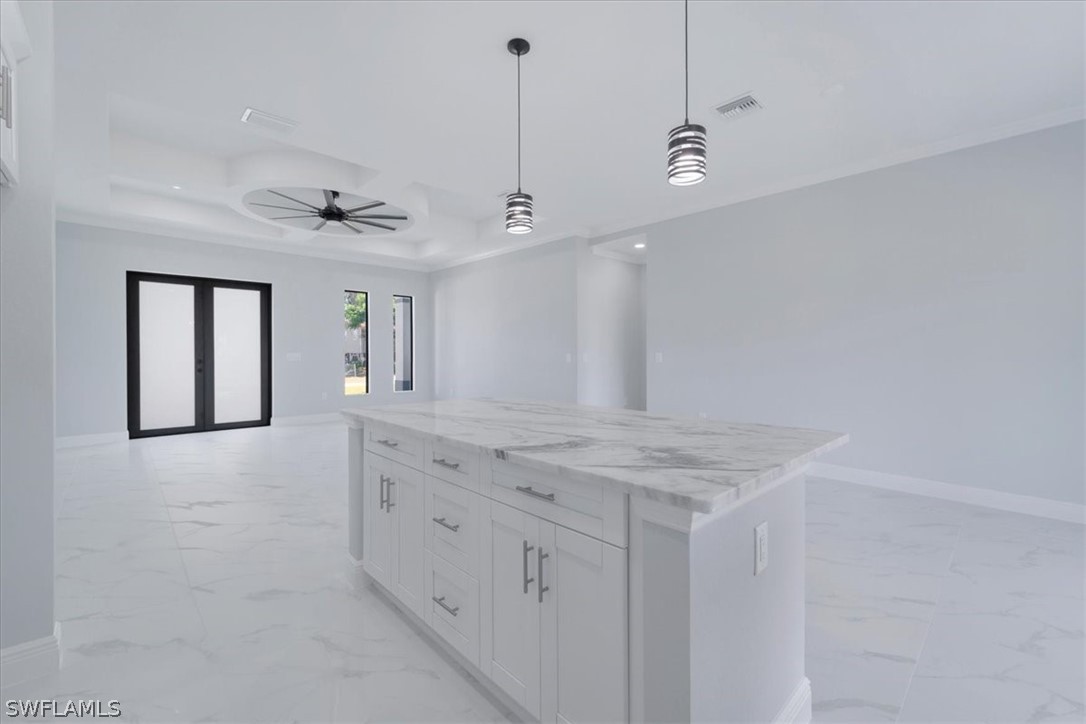 3915 20th Street Southwest Lehigh Acres, FL 33976 - Photo 23 of 50 a bathroom with a sink a vanity and mirror