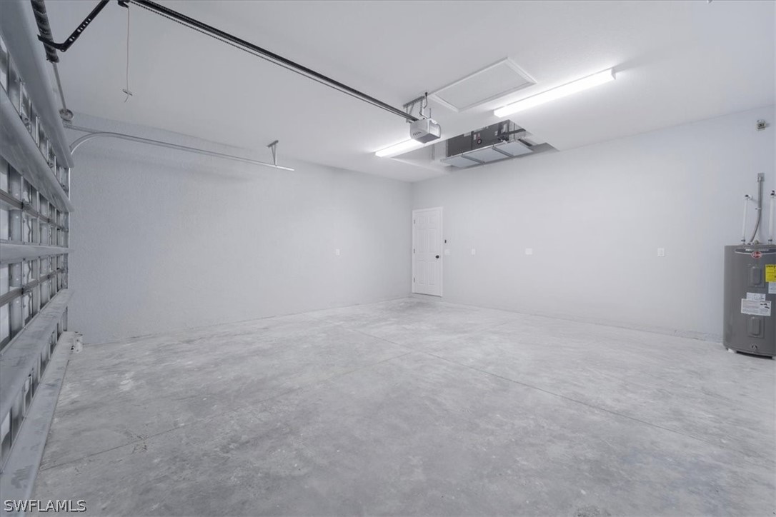 3915 20th Street Southwest Lehigh Acres, FL 33976 - Photo 37 of 50 en empty room with windows and ceiling fan