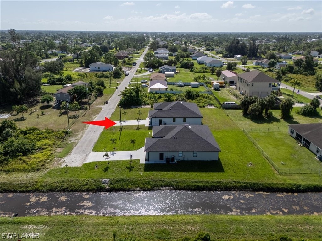 3915 20th Street Southwest Lehigh Acres, FL 33976 - Photo 49 of 50 an aerial view of a house