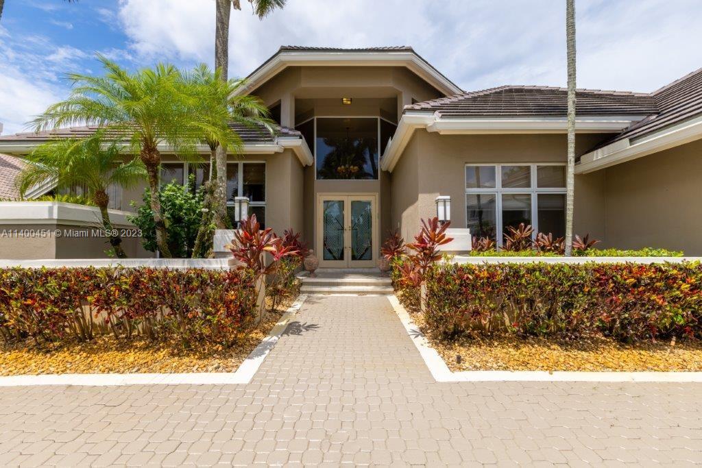 7236 Queenferry Circle Boca Raton, FL 33496 - Photo 2 of 31 a front view of a house