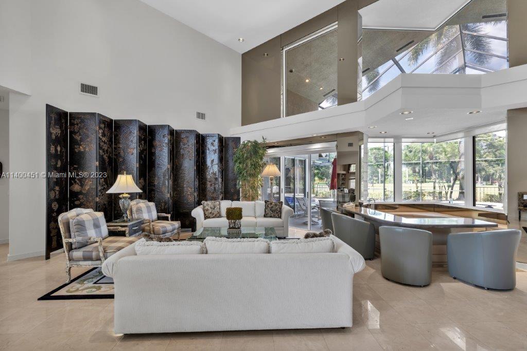 7236 Queenferry Circle Boca Raton, FL 33496 - Photo 7 of 31 a living room with furniture