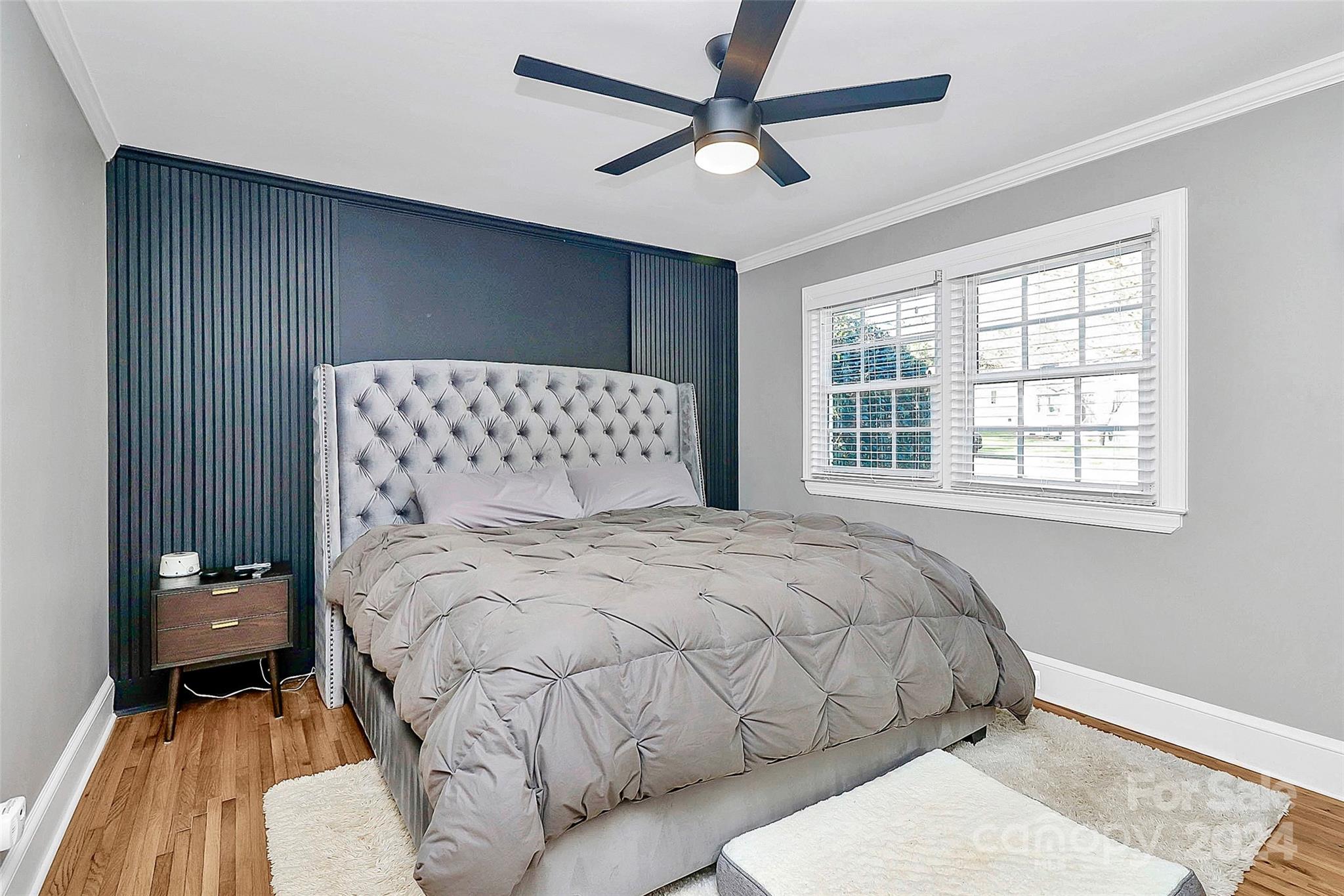 4605 General Pershing Drive Charlotte, NC 28209 - Photo 14 of 35 a bedroom with a large bed and a window