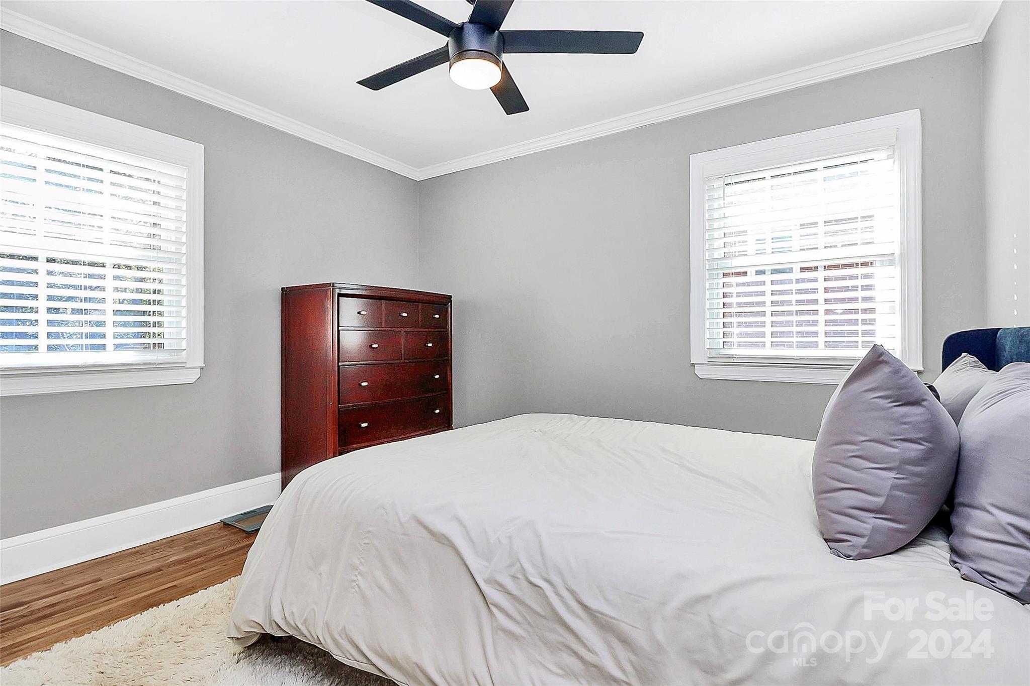 4605 General Pershing Drive Charlotte, NC 28209 - Photo 19 of 35 a bedroom with a bed and window