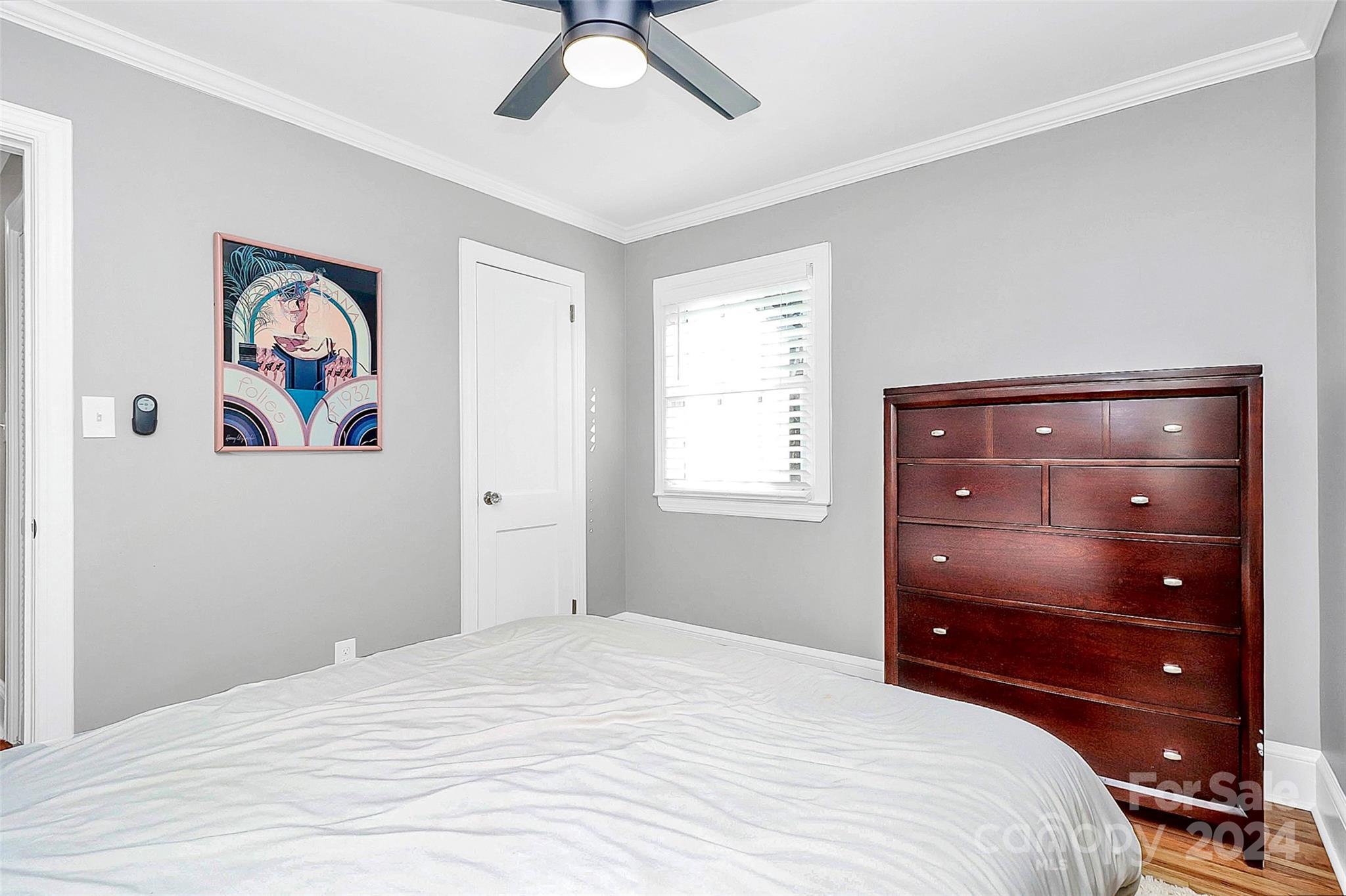 4605 General Pershing Drive Charlotte, NC 28209 - Photo 20 of 35 a bedroom with a bed and a dresser