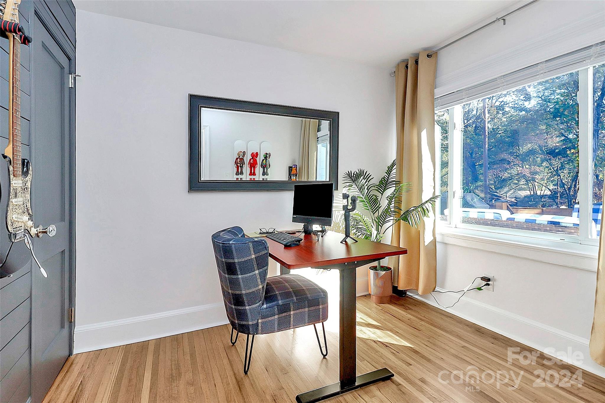 4605 General Pershing Drive Charlotte, NC 28209 - Photo 22 of 35 a workspace with furniture and a window