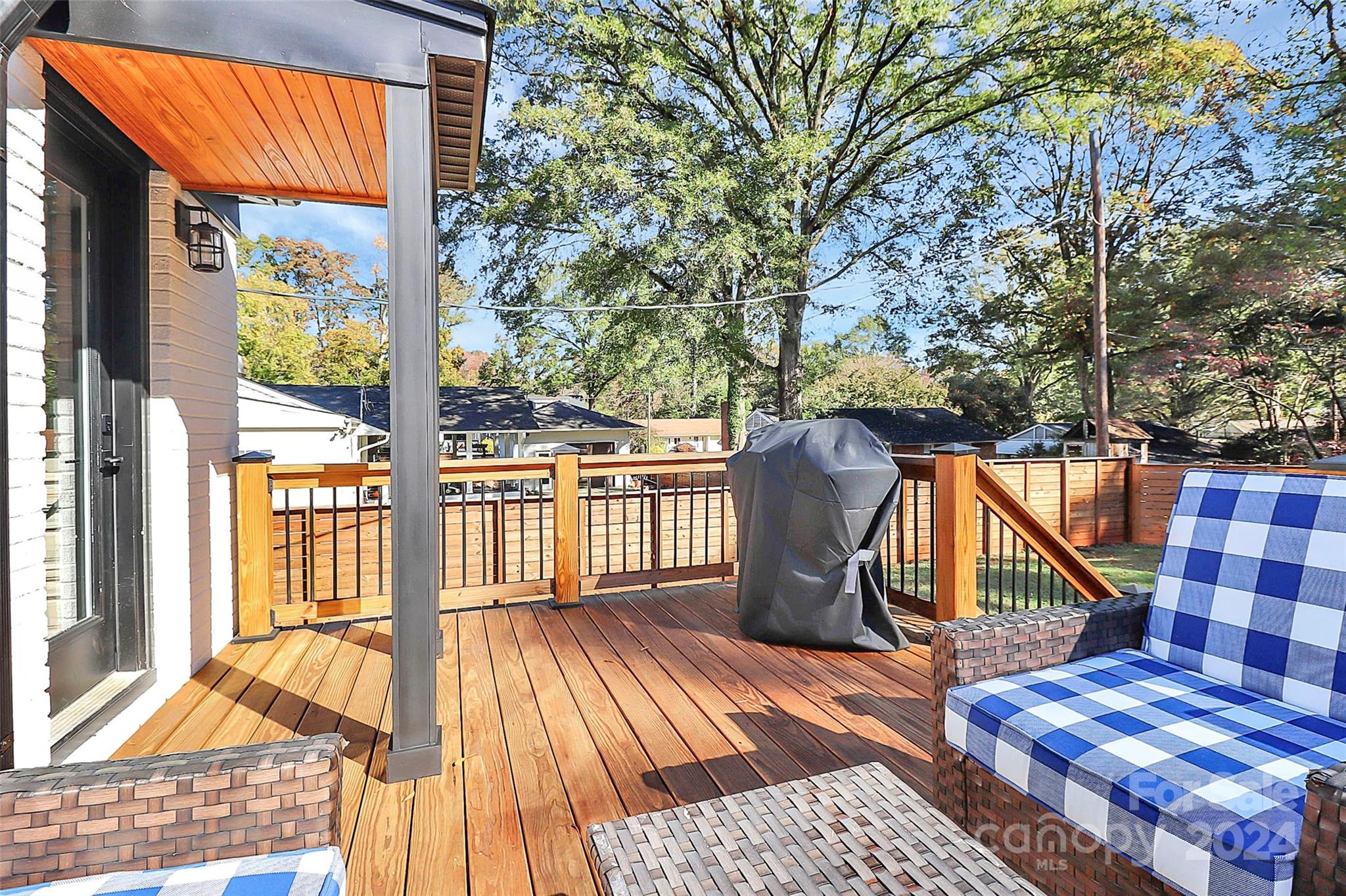4605 General Pershing Drive Charlotte, NC 28209 - Photo 25 of 35 a view of a balcony with wooden floor and fence