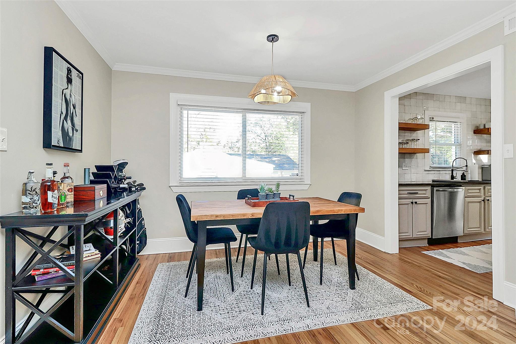 4605 General Pershing Drive Charlotte, NC 28209 - Photo 7 of 35 a view of a dining room with furniture window and wooden floor