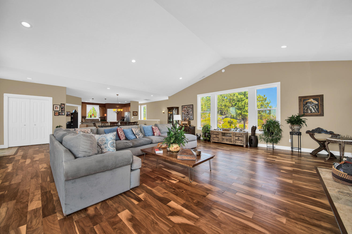 19112 Pumice Butte Road Bend, OR 97702 - Photo 10 of 36 a living room with furniture and a wooden floor