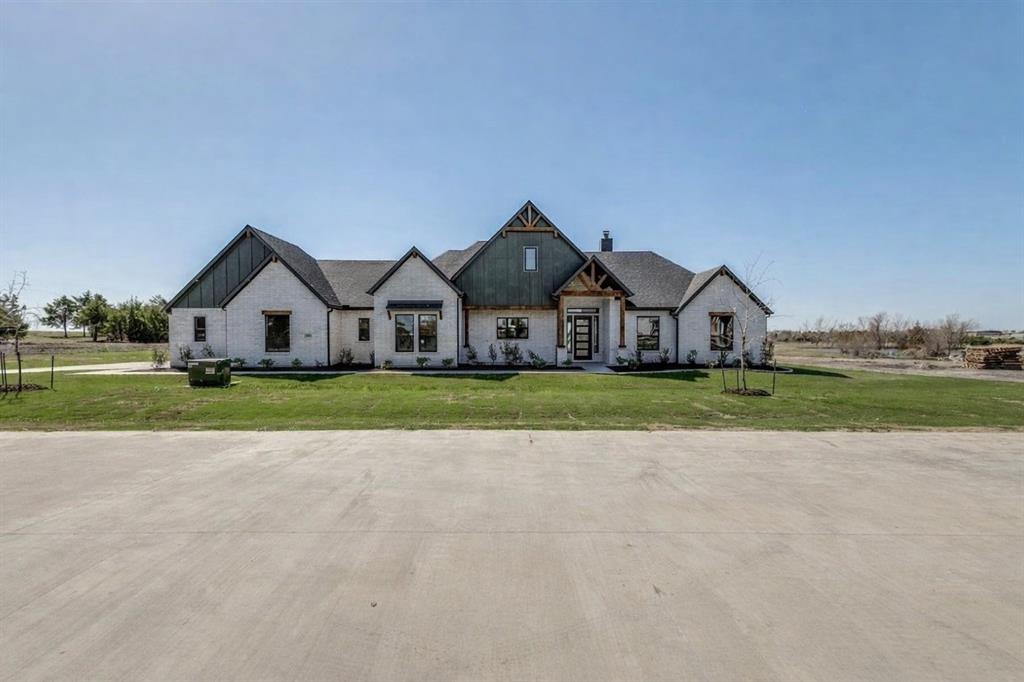 820 Evergreen Way Nevada, TX 75173 - Photo 1 of 37 a view of big house with garden