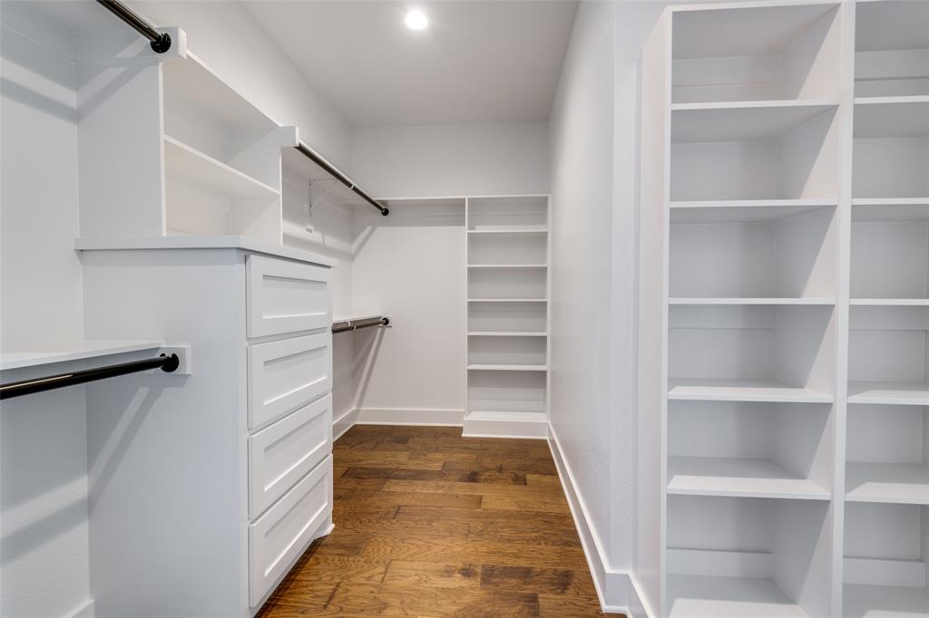 820 Evergreen Way Nevada, TX 75173 - Photo 13 of 37 a view of walk in closet with empty racks