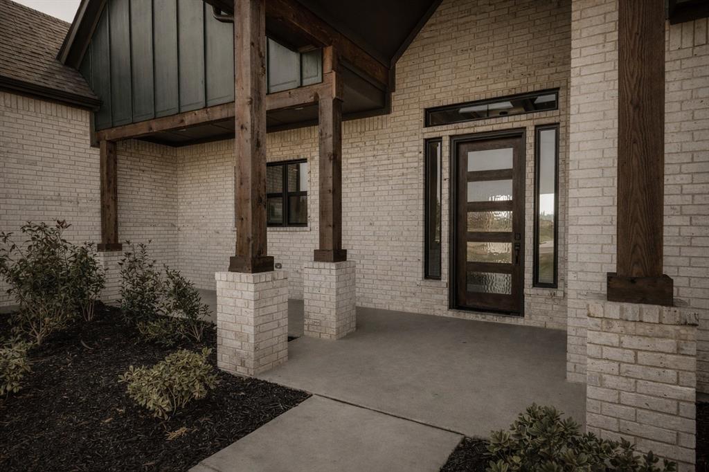 820 Evergreen Way Nevada, TX 75173 - Photo 2 of 37 a view of front door of house and yard